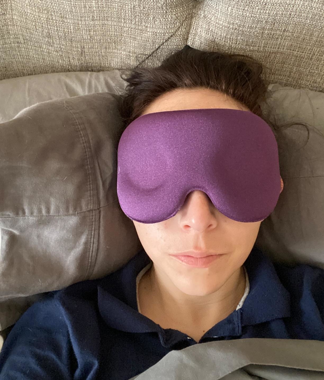 a reviewer wearing the mask in purple