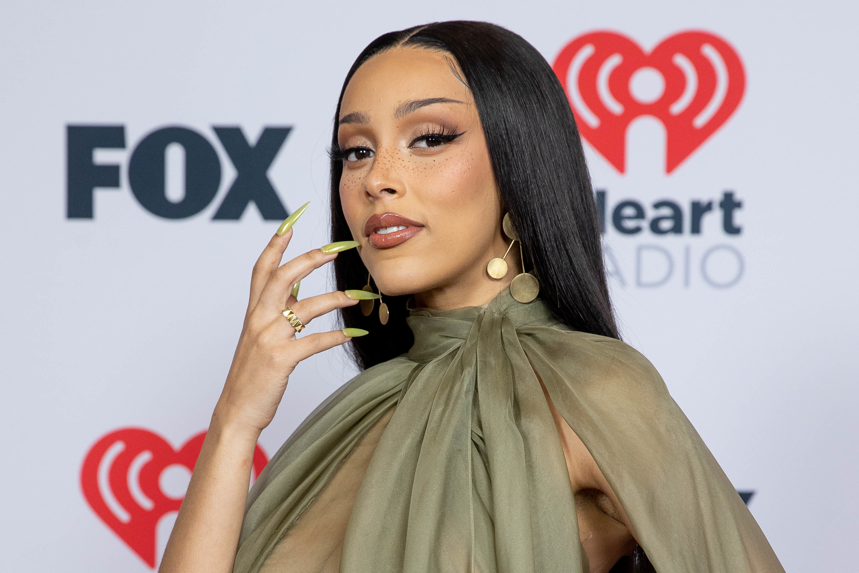 Doja Cat at the 2021 iHeartRadio Music Awards showing off her long nails