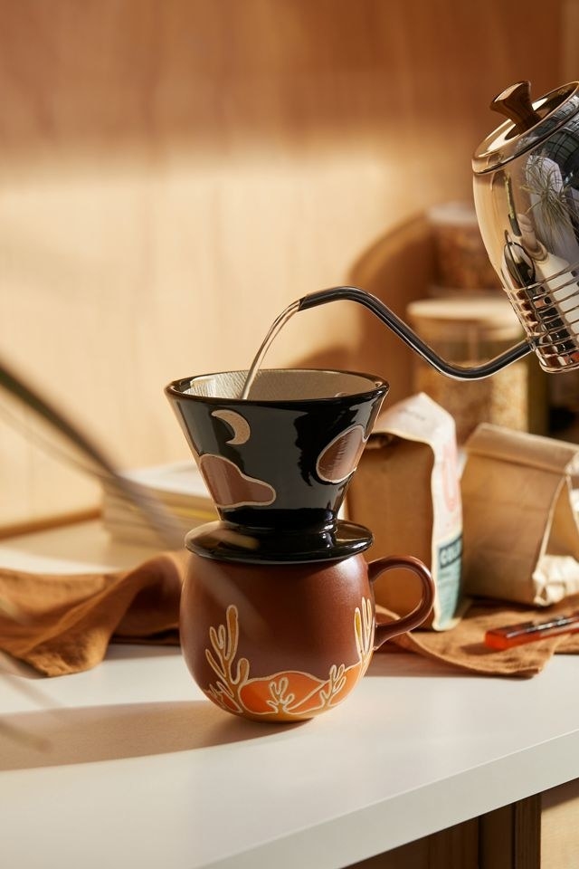 The desert-themed set which comes with a blue pour over and white mug