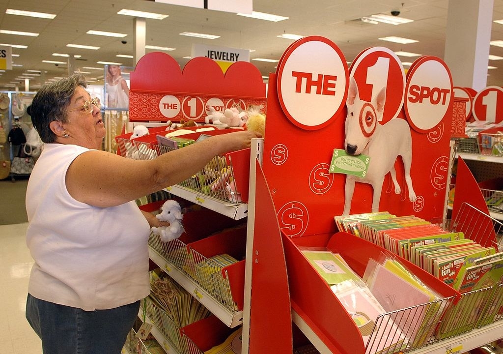 A person shopping the dollar section at Walmart