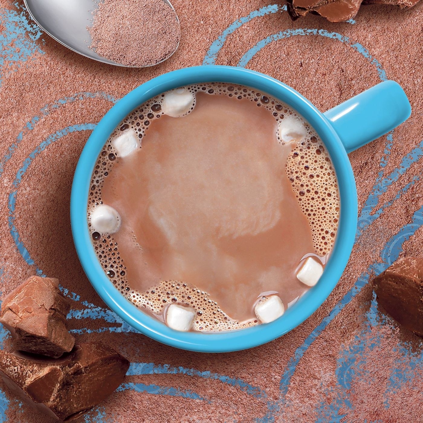 A blue mug full of hot chocolate