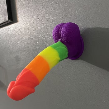 Dildo attached to wall