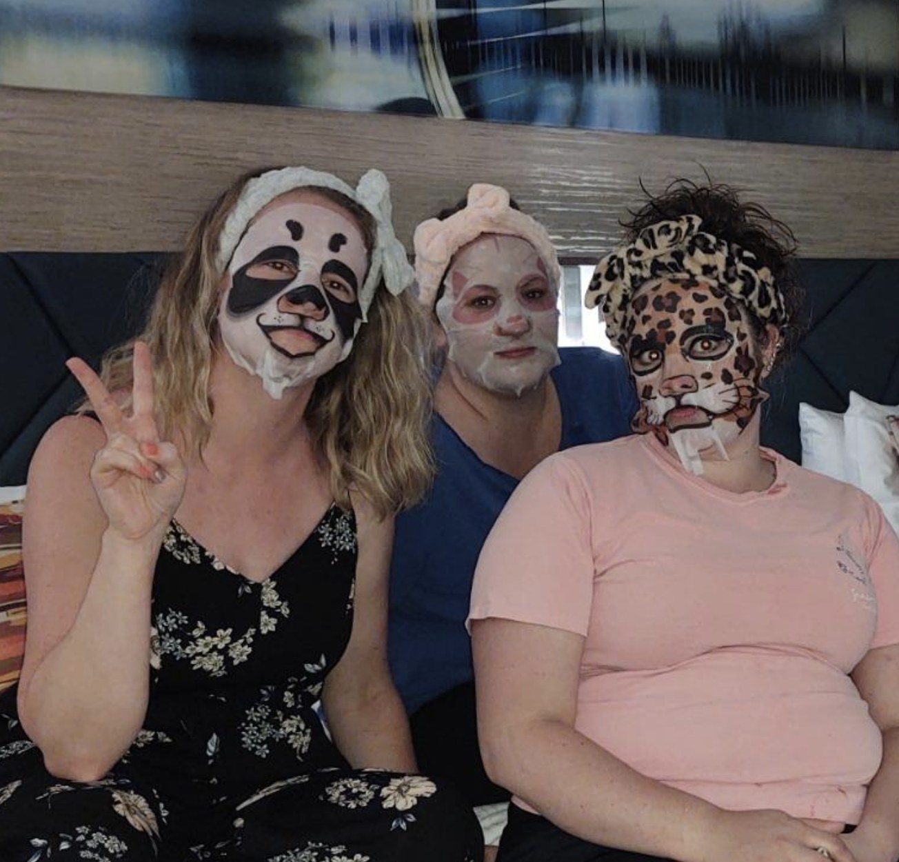 reviewers wearing the animal face masks