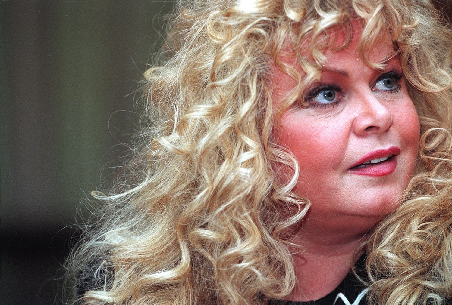 Sally Struthers listening to someone