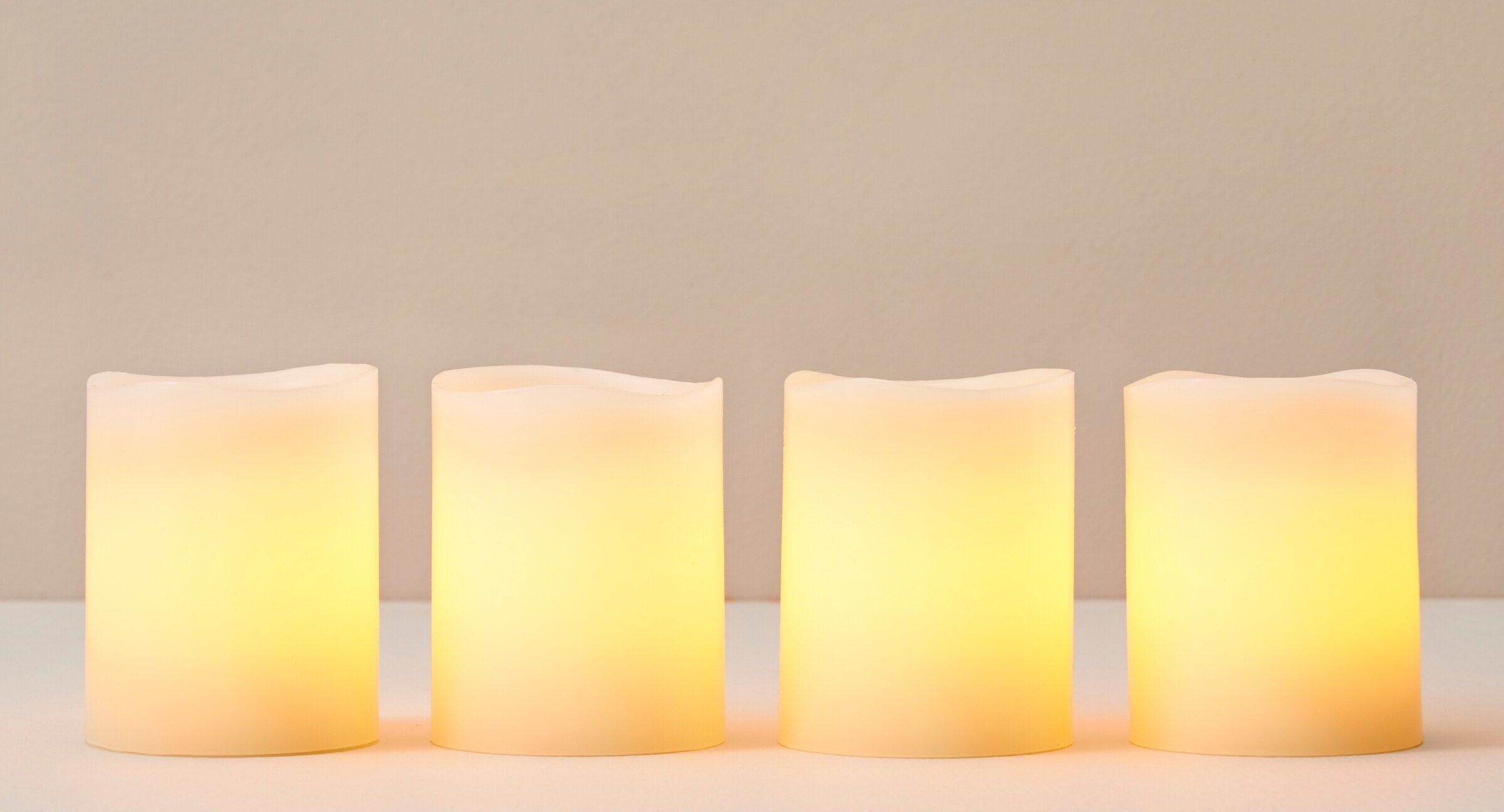 Four LED candles in a row