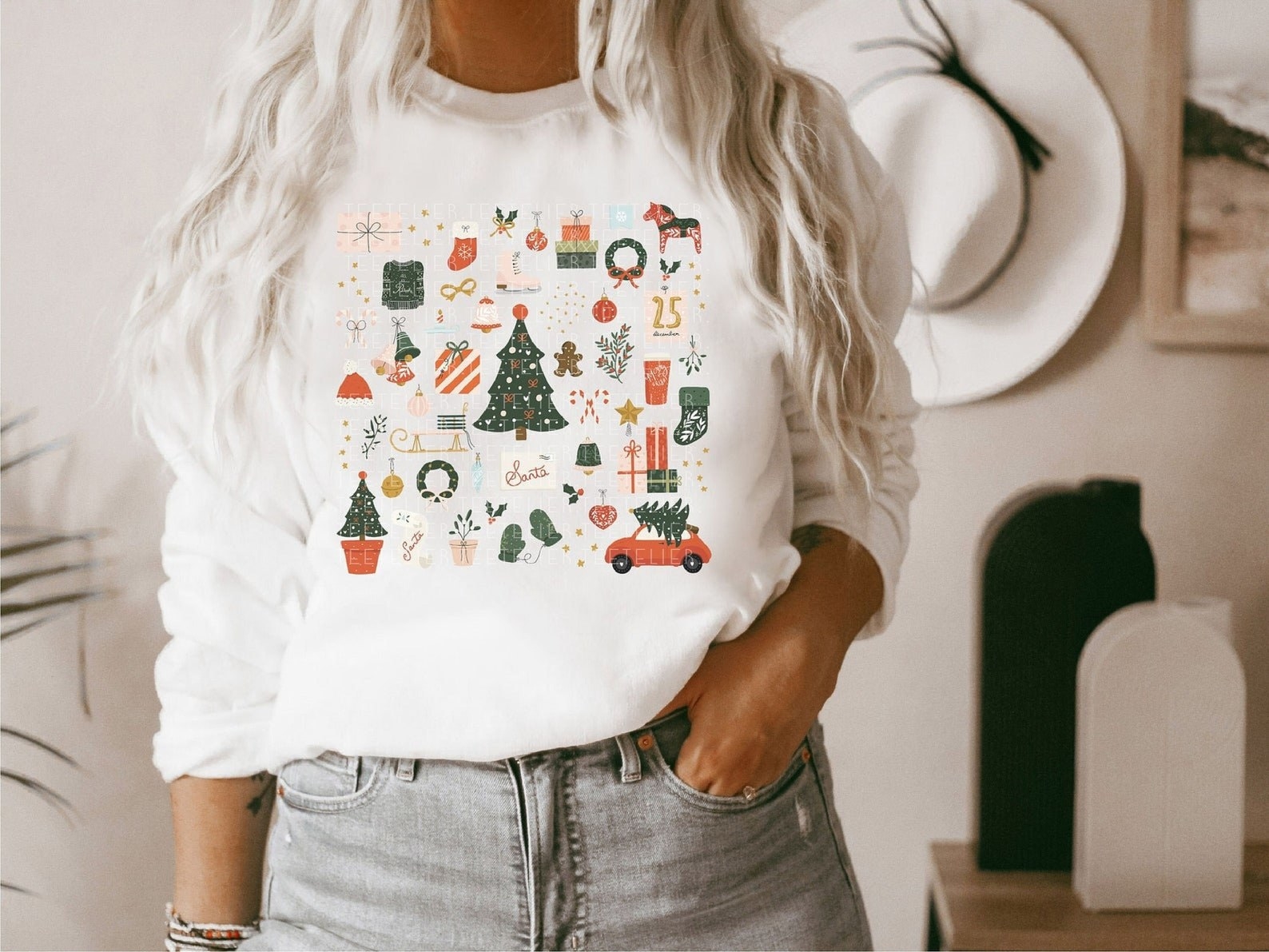 Model wearing white sweatshirt with Christmas pattern
