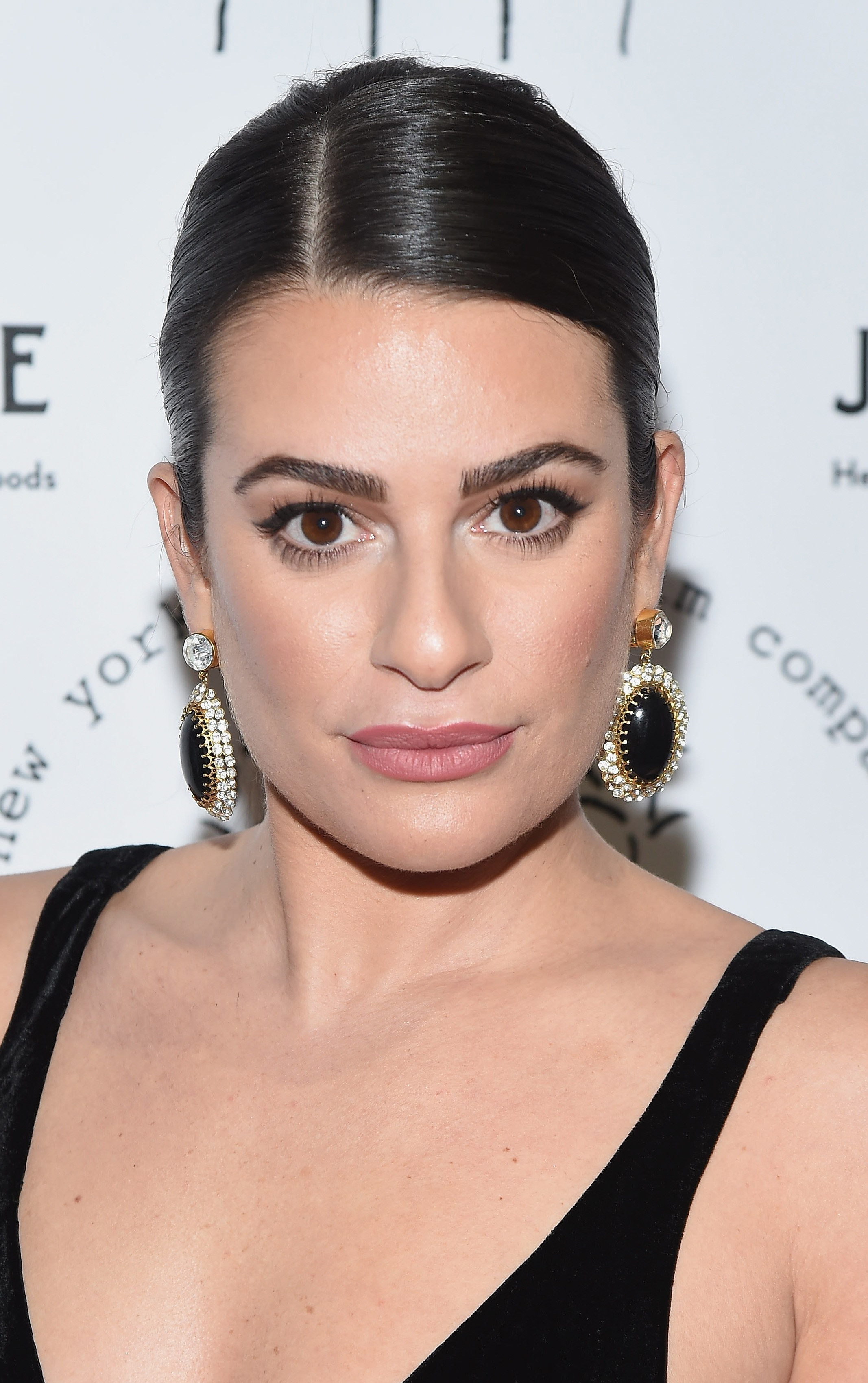 Lea Michele posing with a straight face at an event