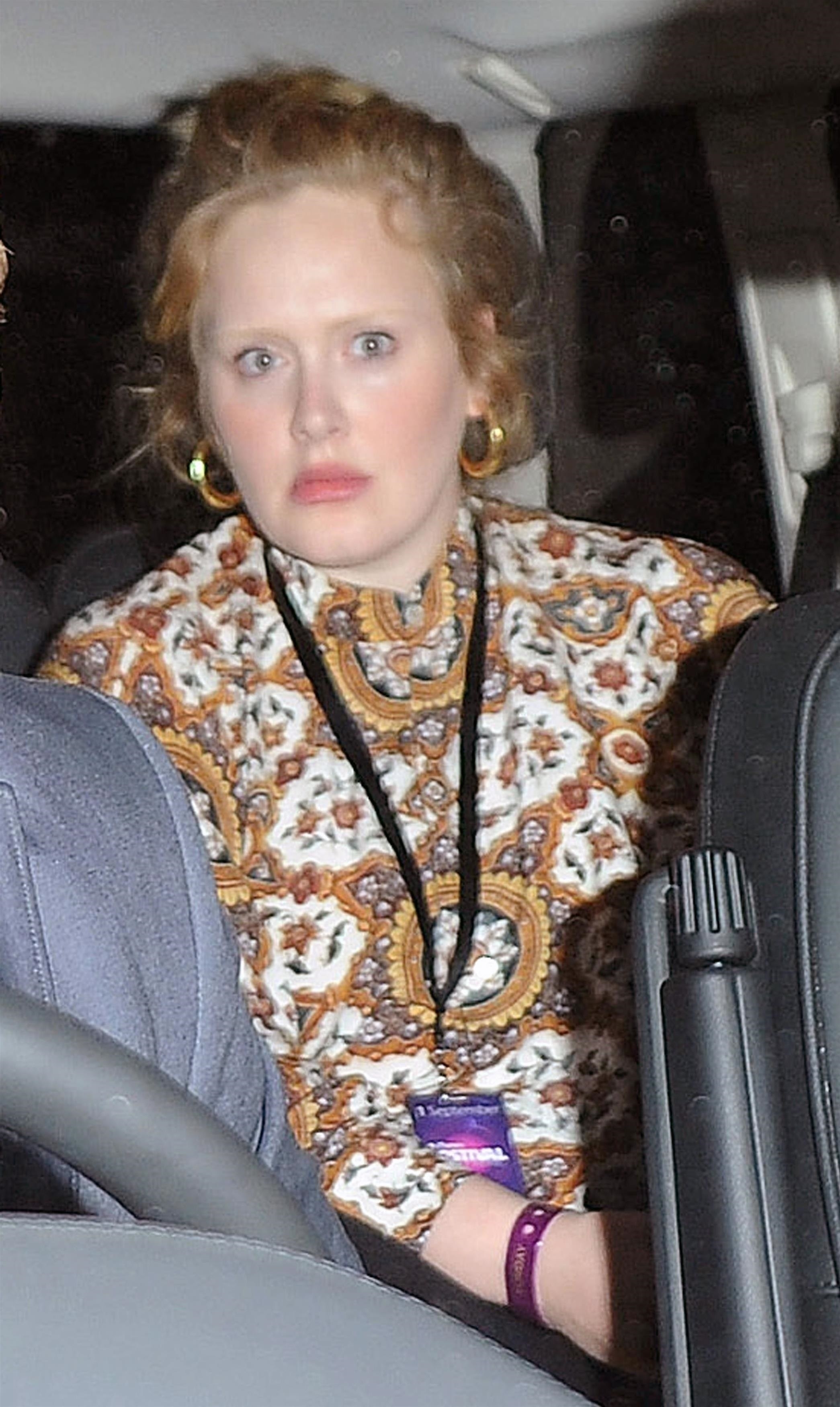 adele looking at the camera off guard
