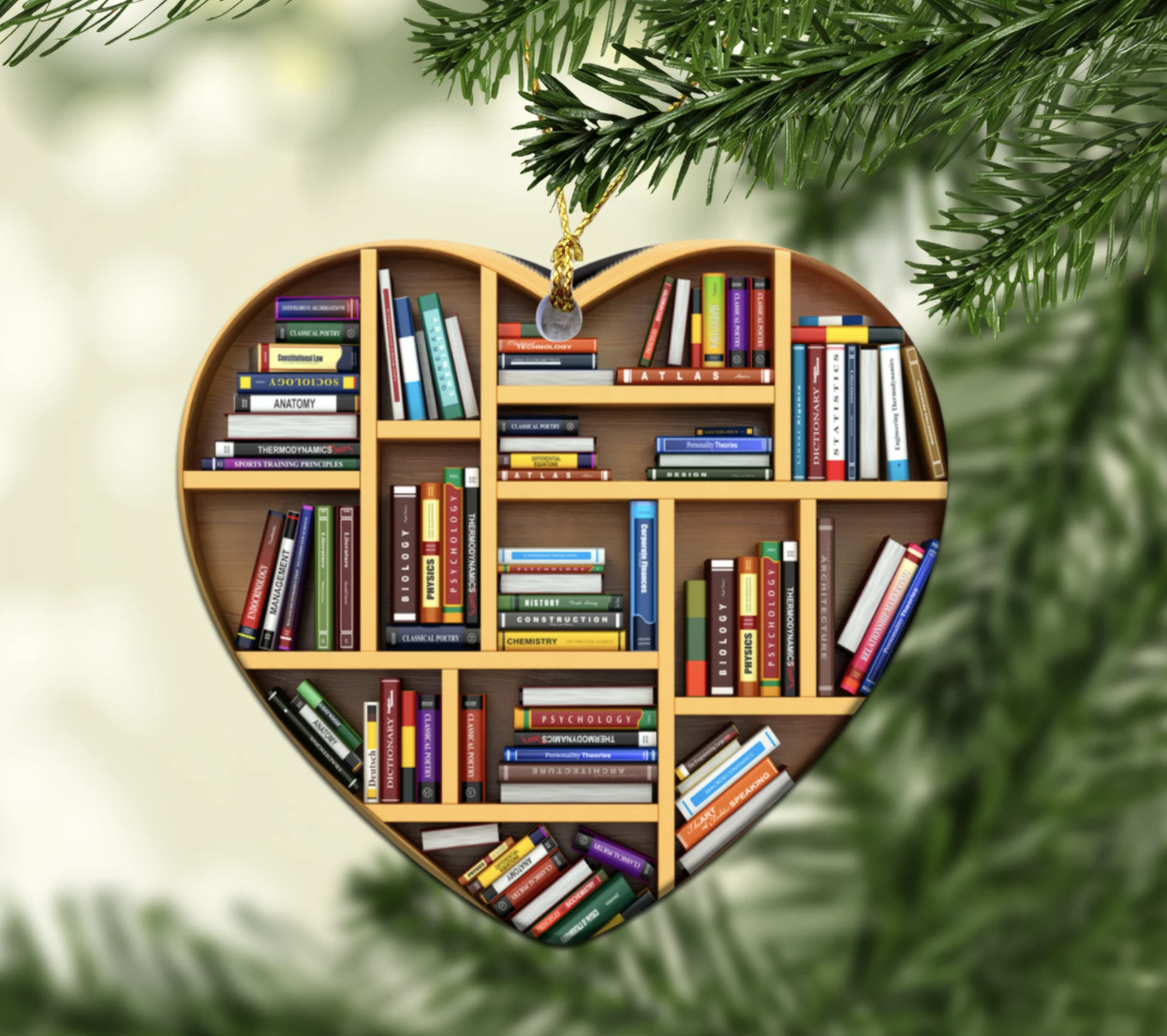 heart shaped ornament with tiny books on shelves inside