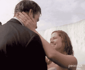 Jim and Pam kissing at their wedding on the Maid of the Mist