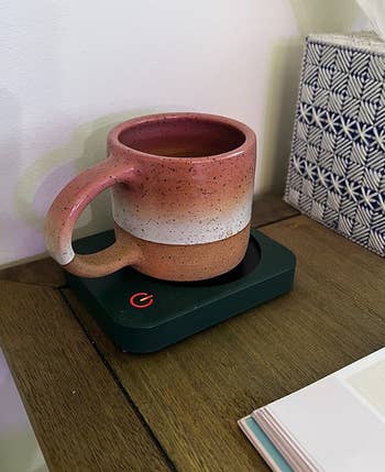 a mug sitting on the warmer