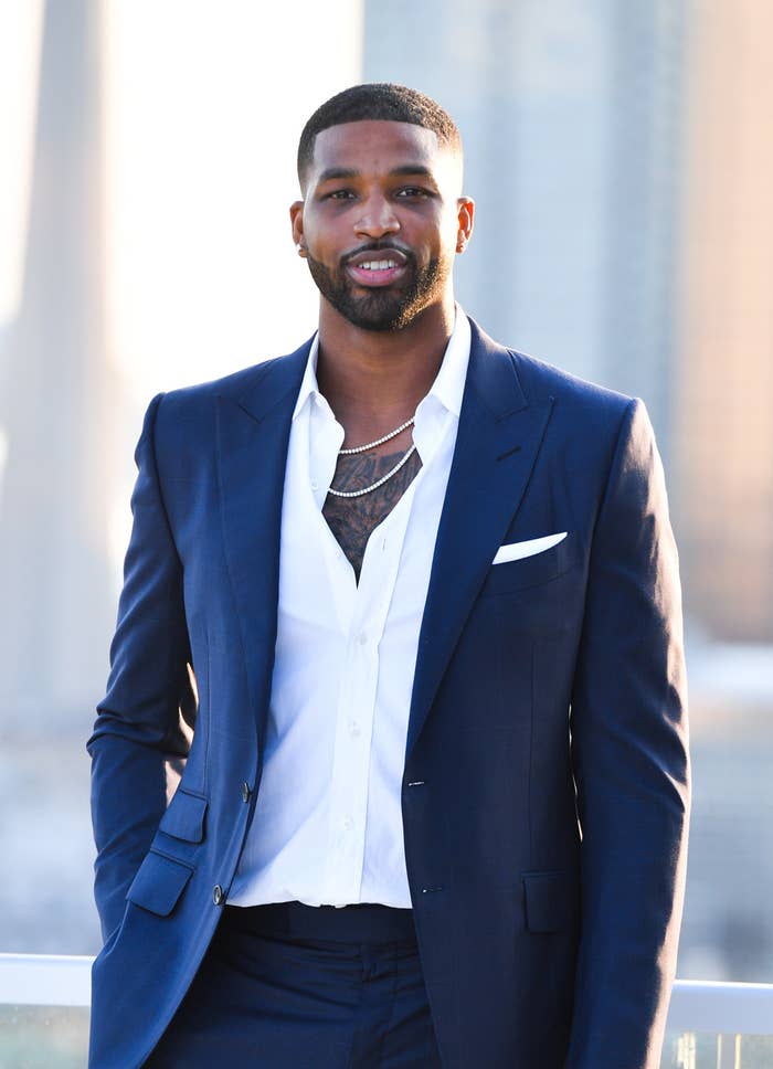 Tristan Thompson spotted outside wearing a dress shirt, slacks, and a jacket