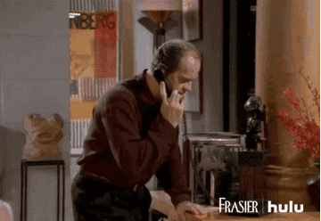 Frasier from &quot;Frasier&quot; talking on the phone.