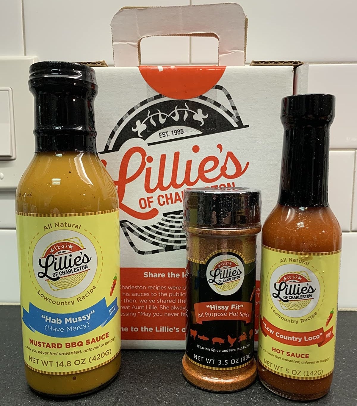 Reviewer photo of the barbecue sauce, spice rub, and hot sauce