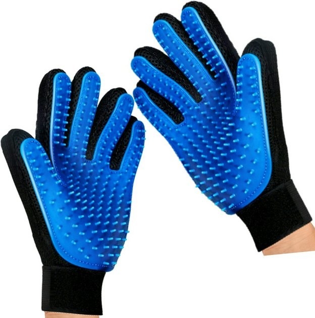 a model wearing the blue and black textured gloves