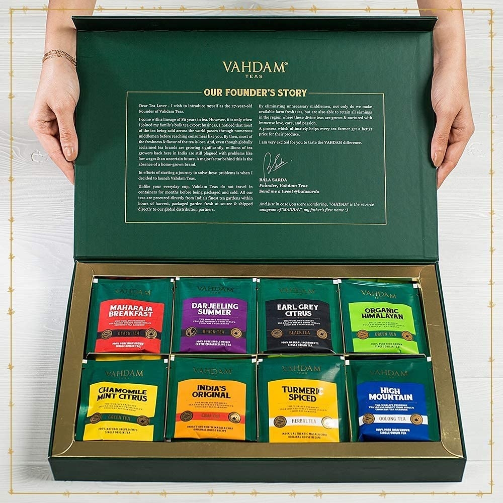 A box with different packets of tea in it
