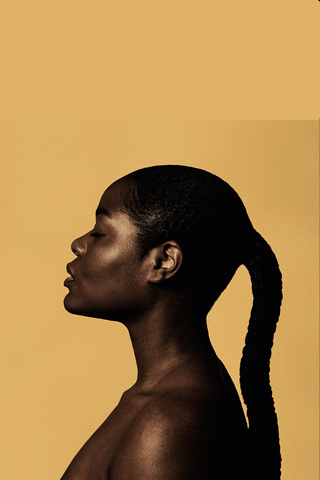 A woman's profile is featured as she closes her eyes and