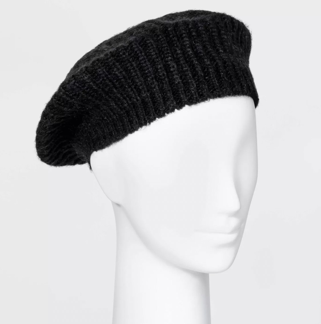 Black rib knit beret on a mannequin