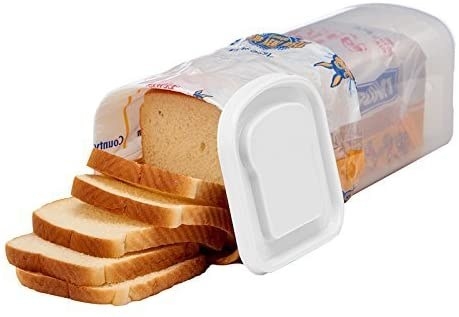 bread-shaped container with loaf of sliced bread inside; bag loops over the top; lid goes on one end