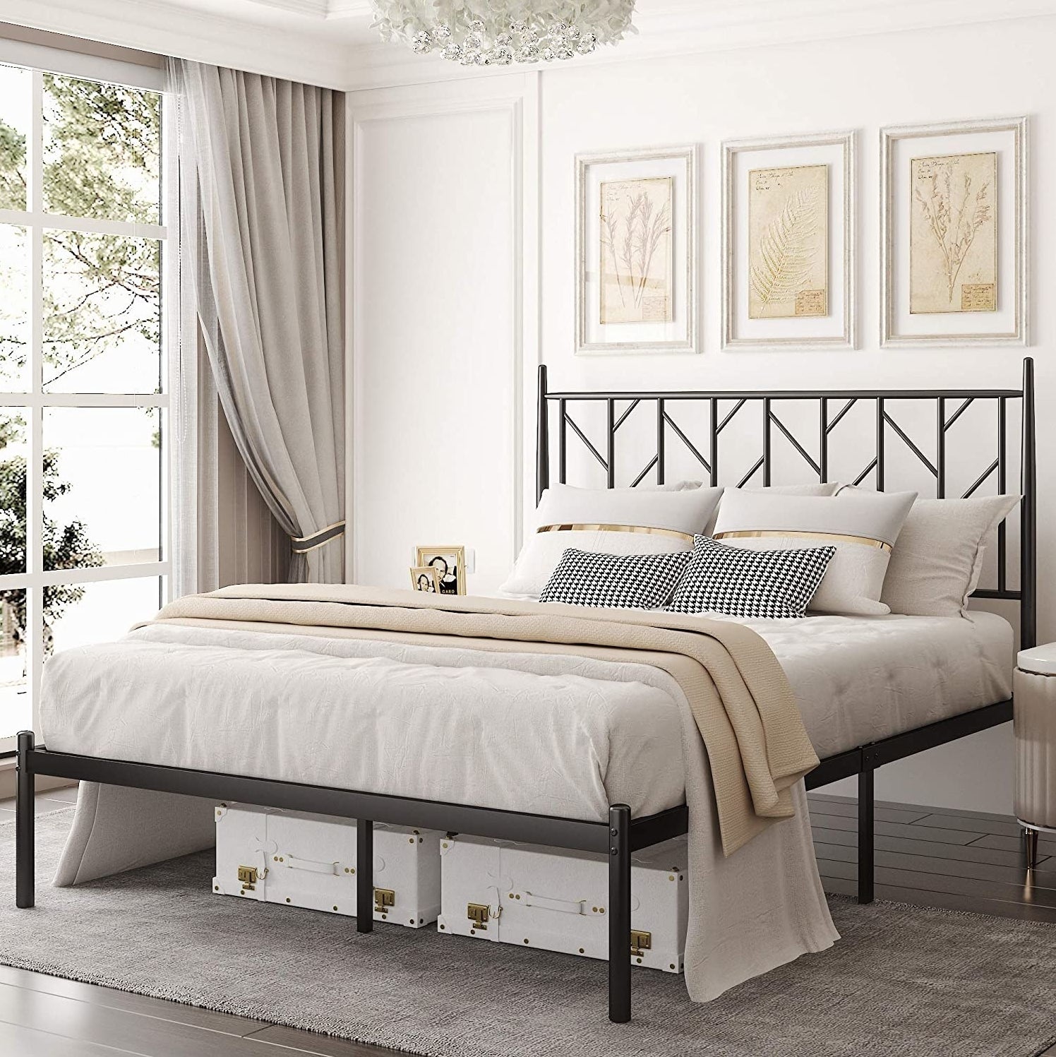 Image of black bed frame with linens