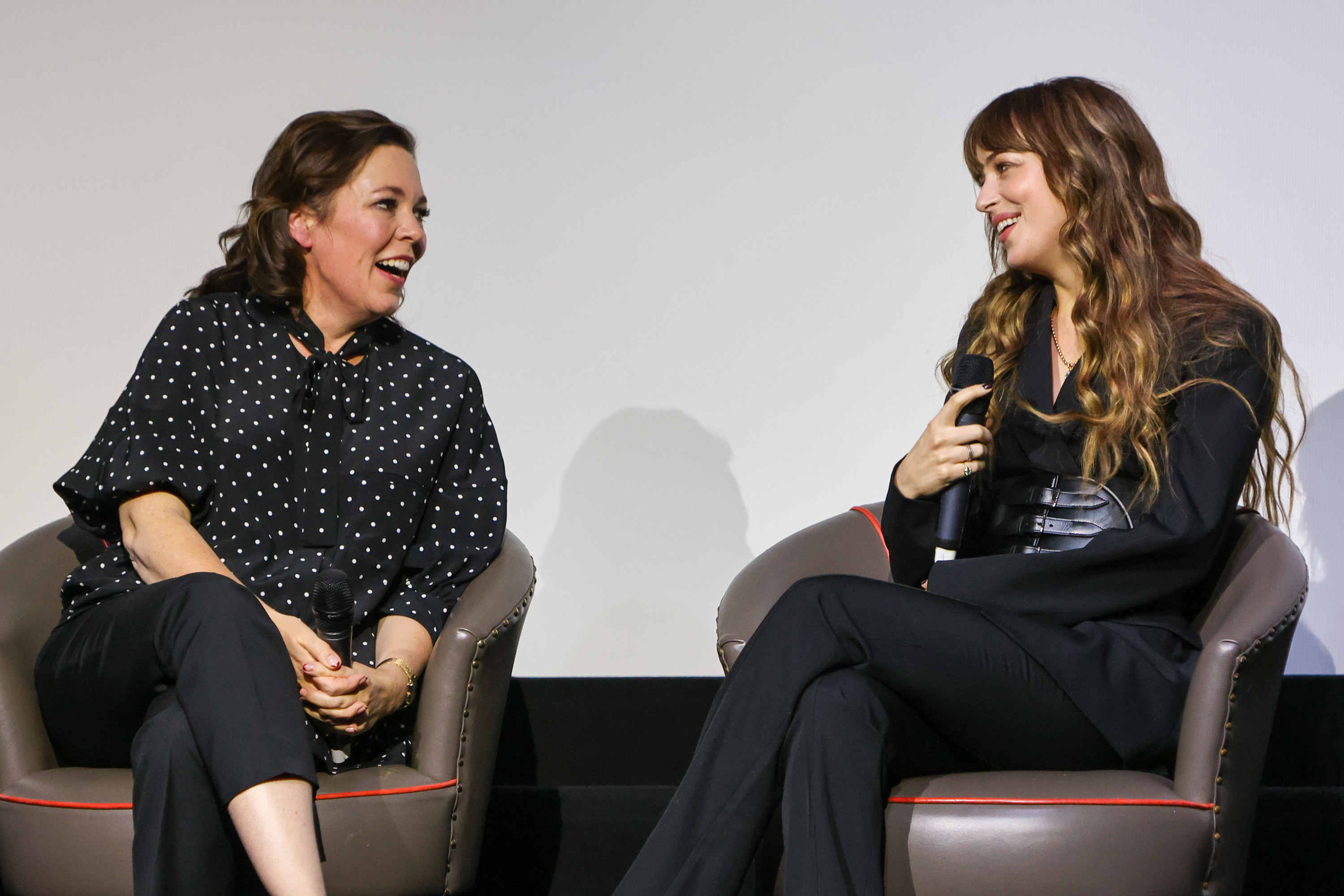 Olivia Colman and Dakota Johnson speak at a screening of The Lost Daughter