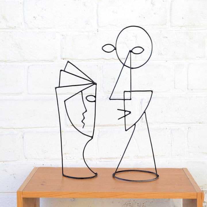 Abstract wire face sculptures