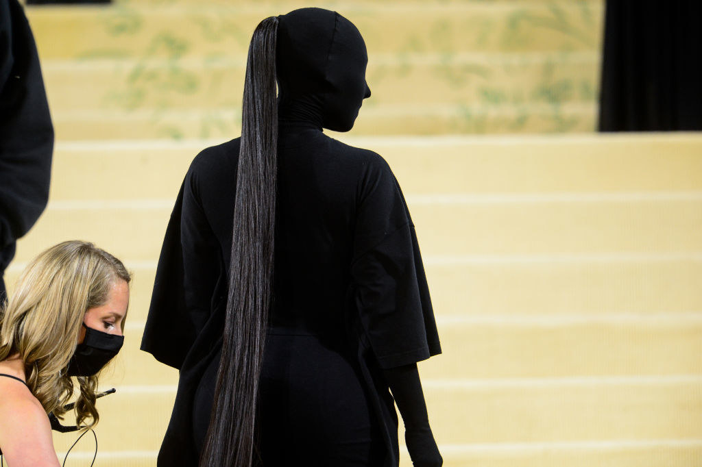kim kardashian in an all-black morph suit on the met gala steps