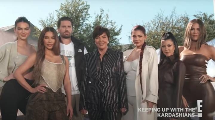 Kendall Jenner, Kim Kardashian, Scott Disick, Kris Jenner, Kylie Jenner, Kourtney Kardashian and Khloe Kardashian standing in a line in the keeping up with the kardashians promo