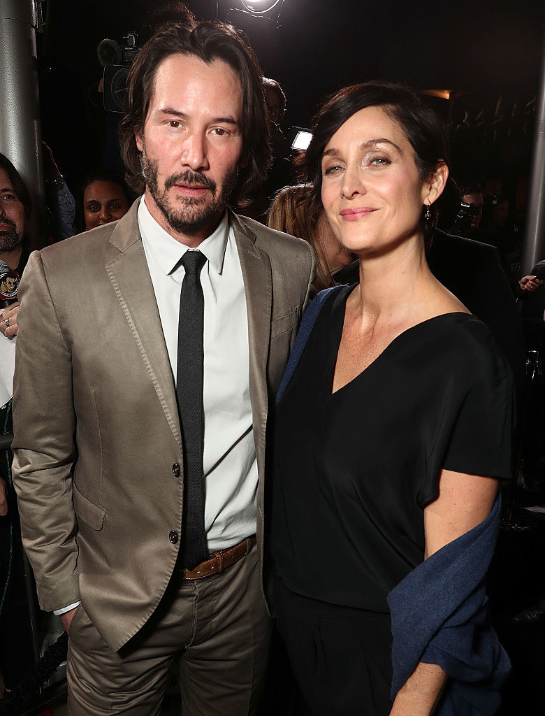 Carrie-Anne Moss and Keanu Reeves attend the premiere of John Wick: Chapter Two