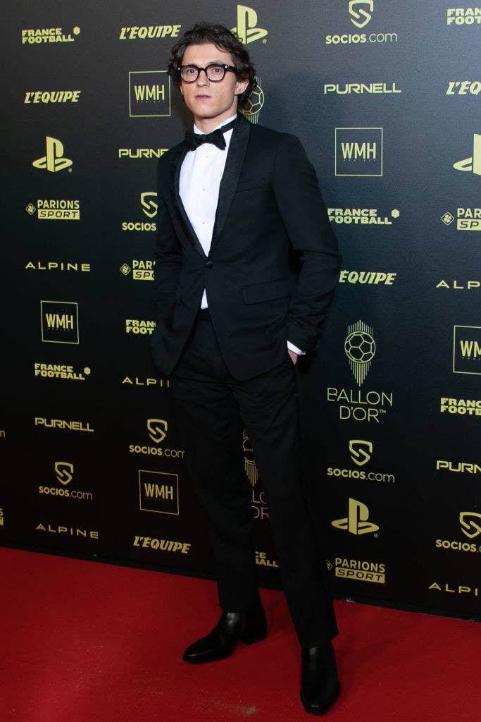 Tom rocks a tuxedo at the the Ballon D&#x27;Or red carpet