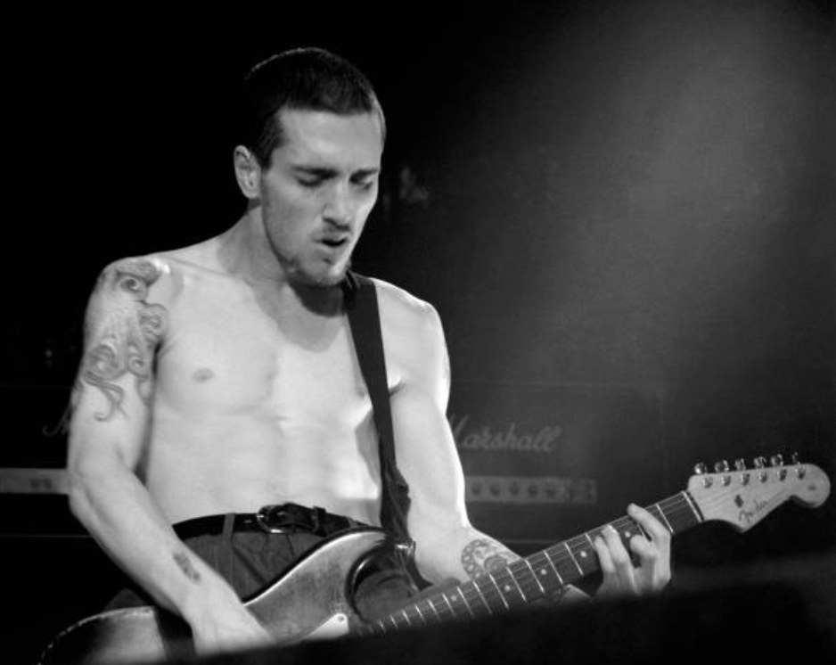 John Frusciante performs at the Blood Sugar Sex Magik Tour with the Red Hot Chili Peppers