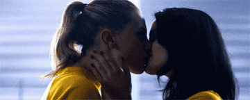 Betty and Veronica kiss.