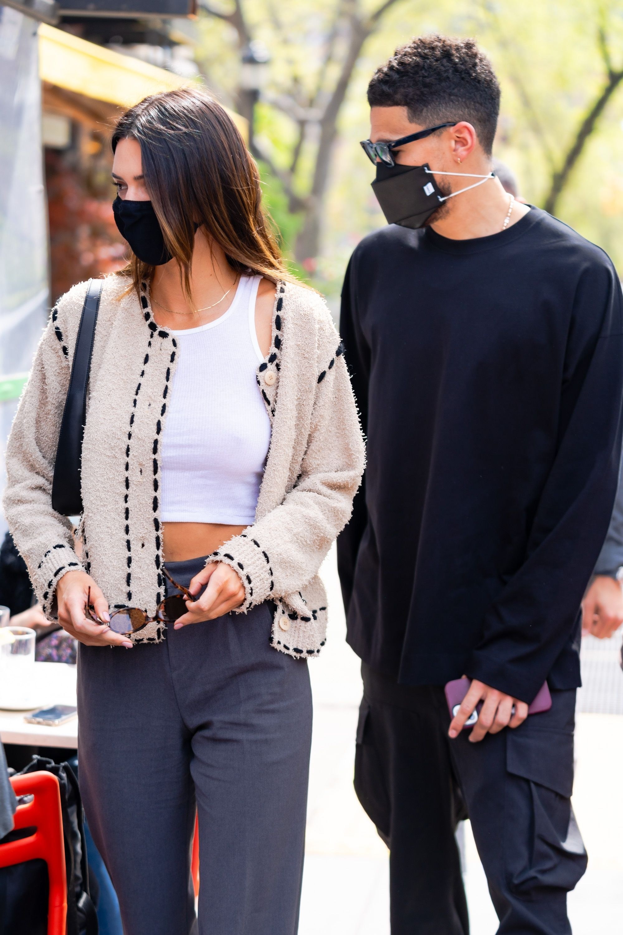 Kendall Jenner (L) and Devin Booker are seen in SoHo on April 24, 2021 in New York City
