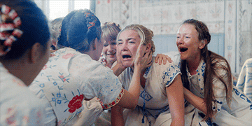 A GIF of Florence screaming in Midsommar