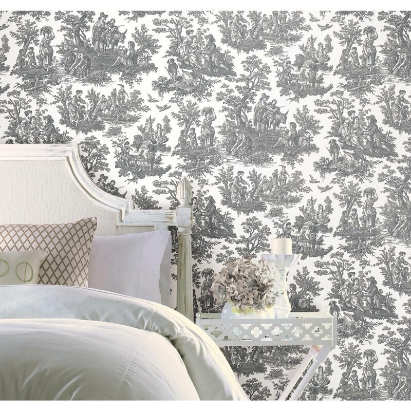 The grey wallpaper in a bedroom