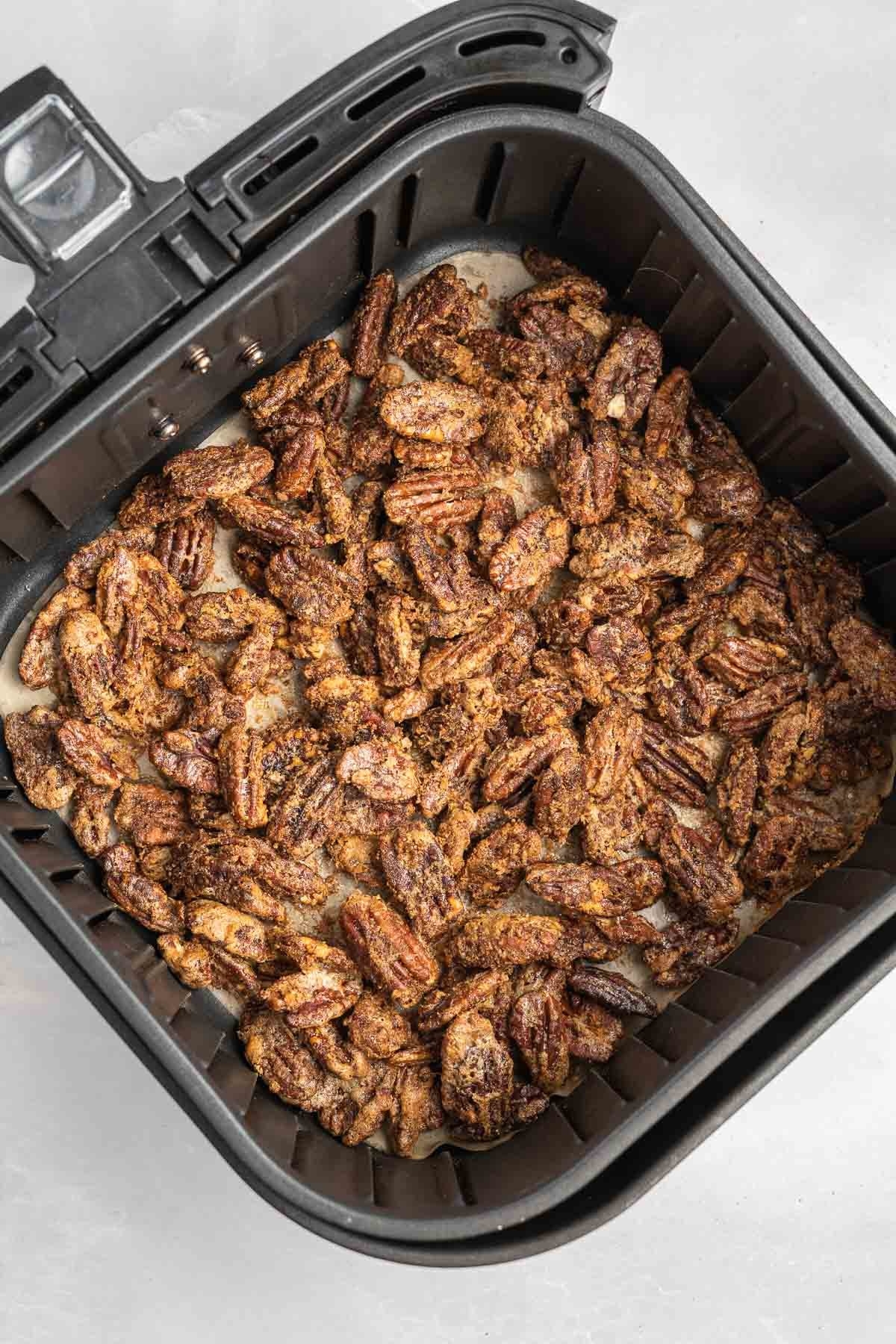Candied pecans in the air fryer basket