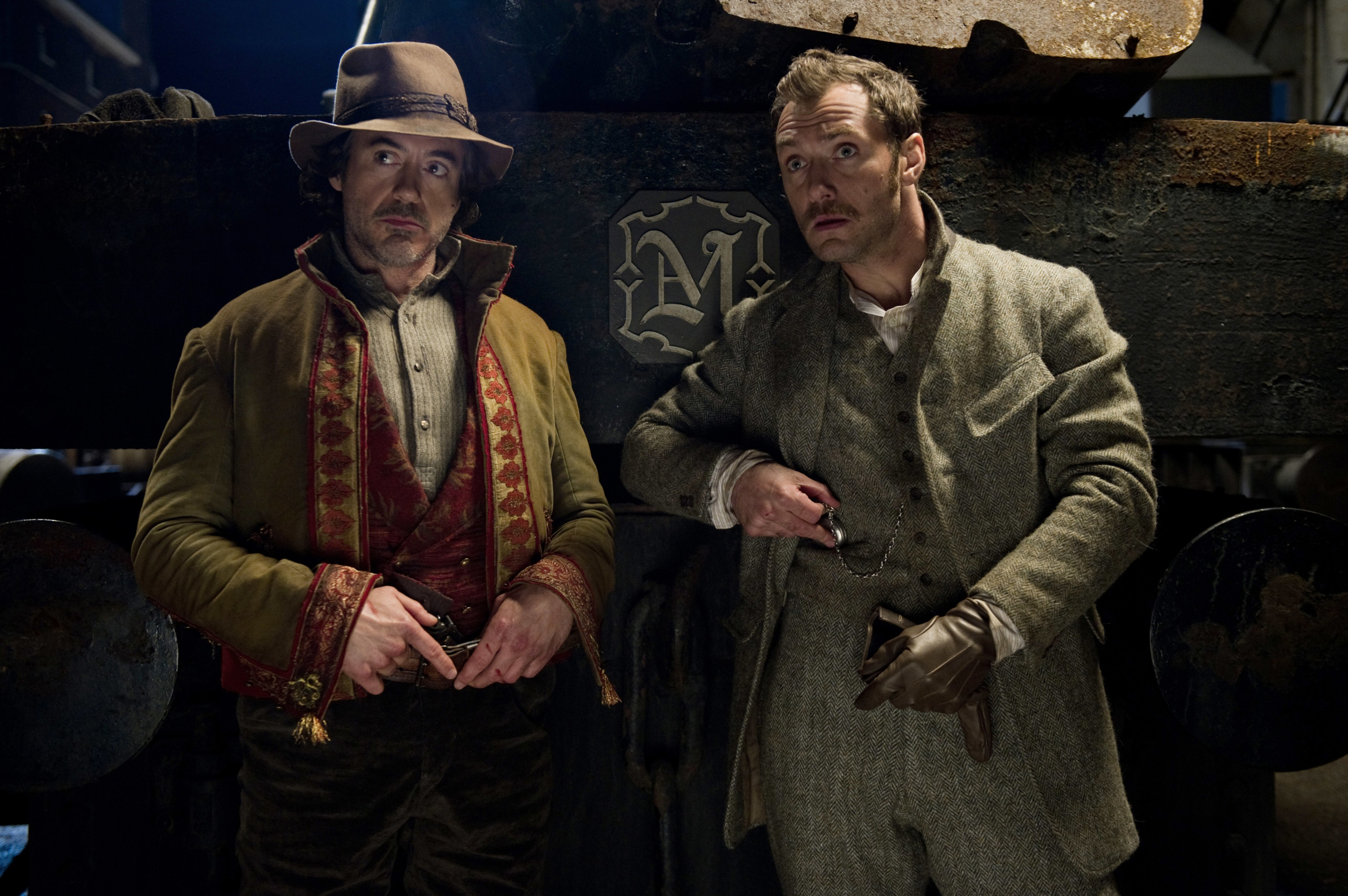 Holmes and Watson standing next to each other