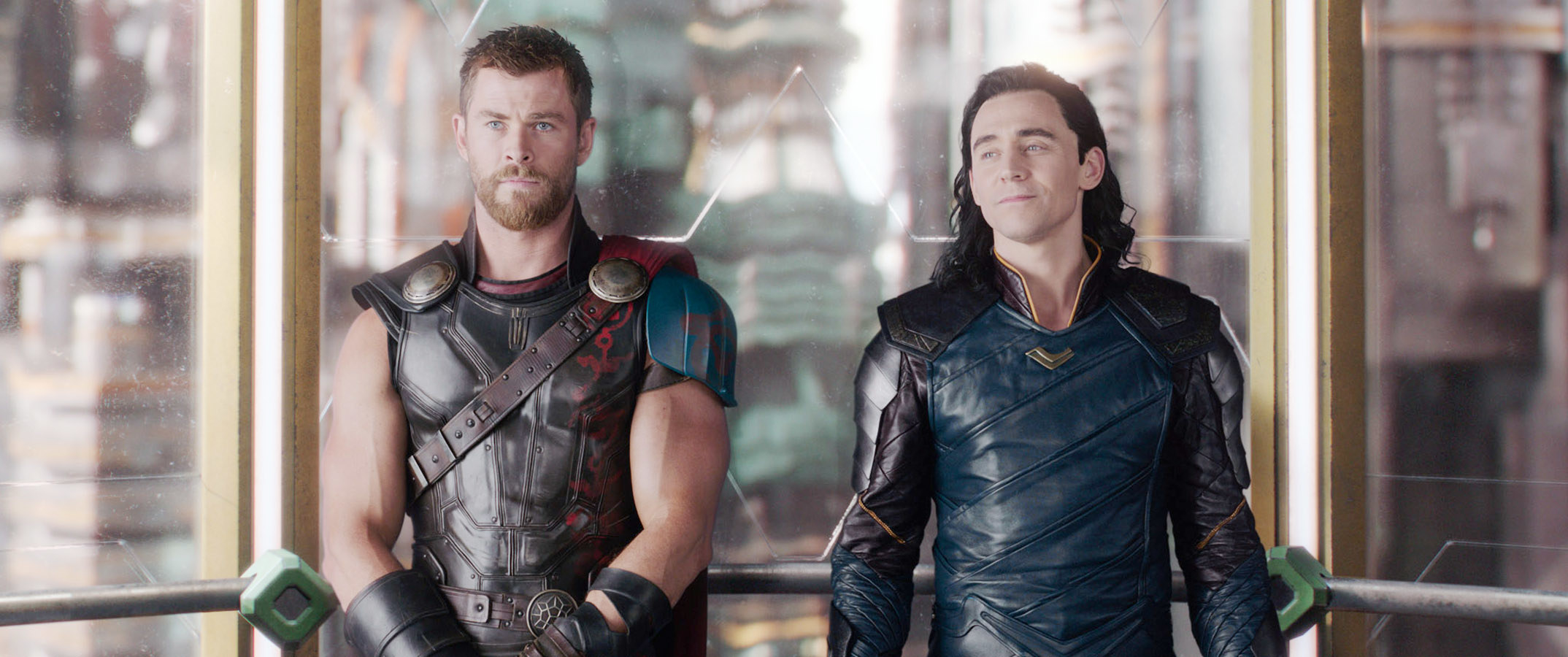 Thor and Loki standing side-by-side