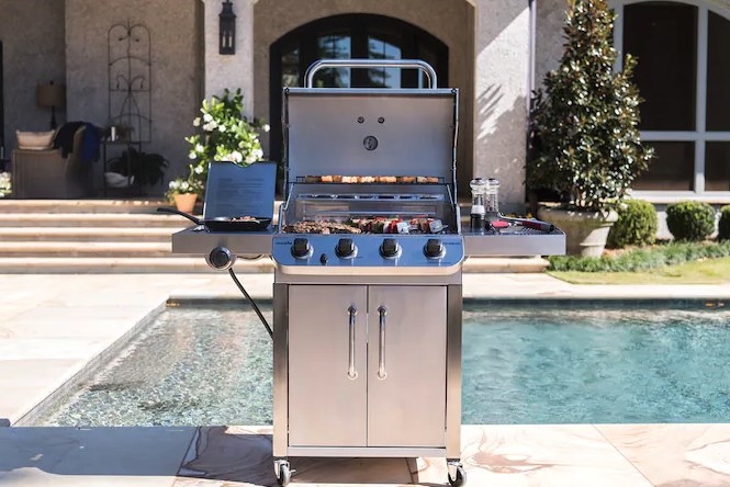 stainless steel grill on side of pool