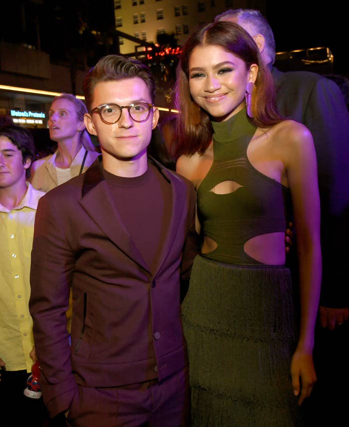 Tom and Zendaya posing for a photo together at an event