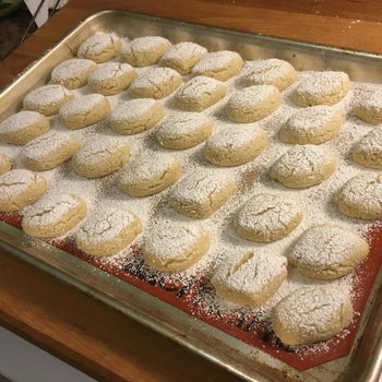 Reviewer photo of powdered sugar-covered cookies on the sheet tray
