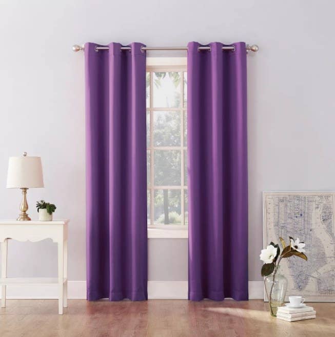 An image of a pair of kids&#x27; bedroom blackout grommet top curtain panels