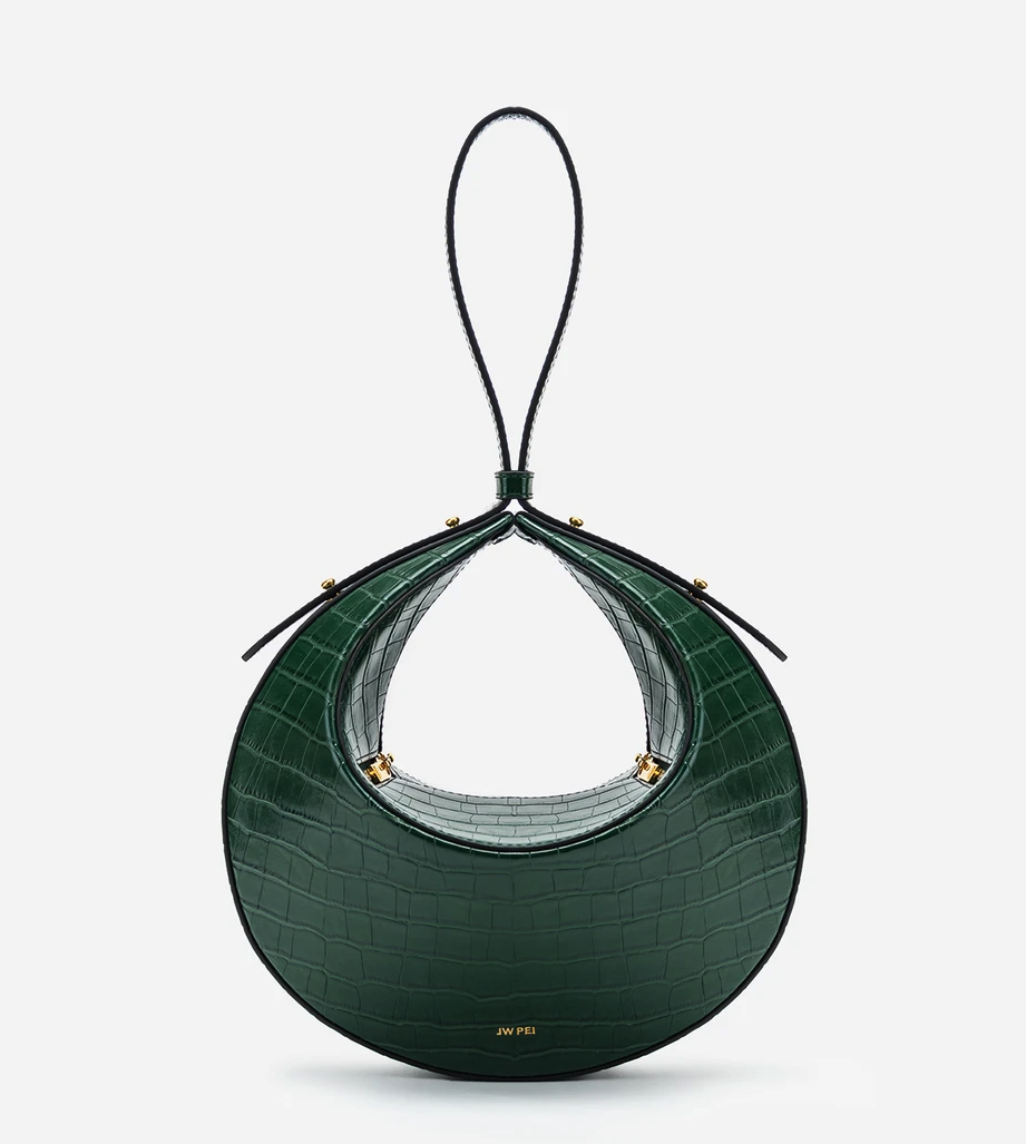 round green croc embossed handbag