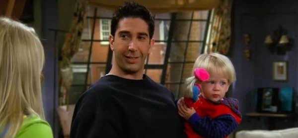 Ross holding Ben with Barbie