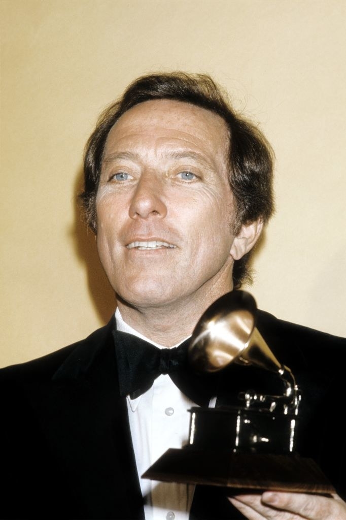 Andy Williams holding a Grammy trophy
