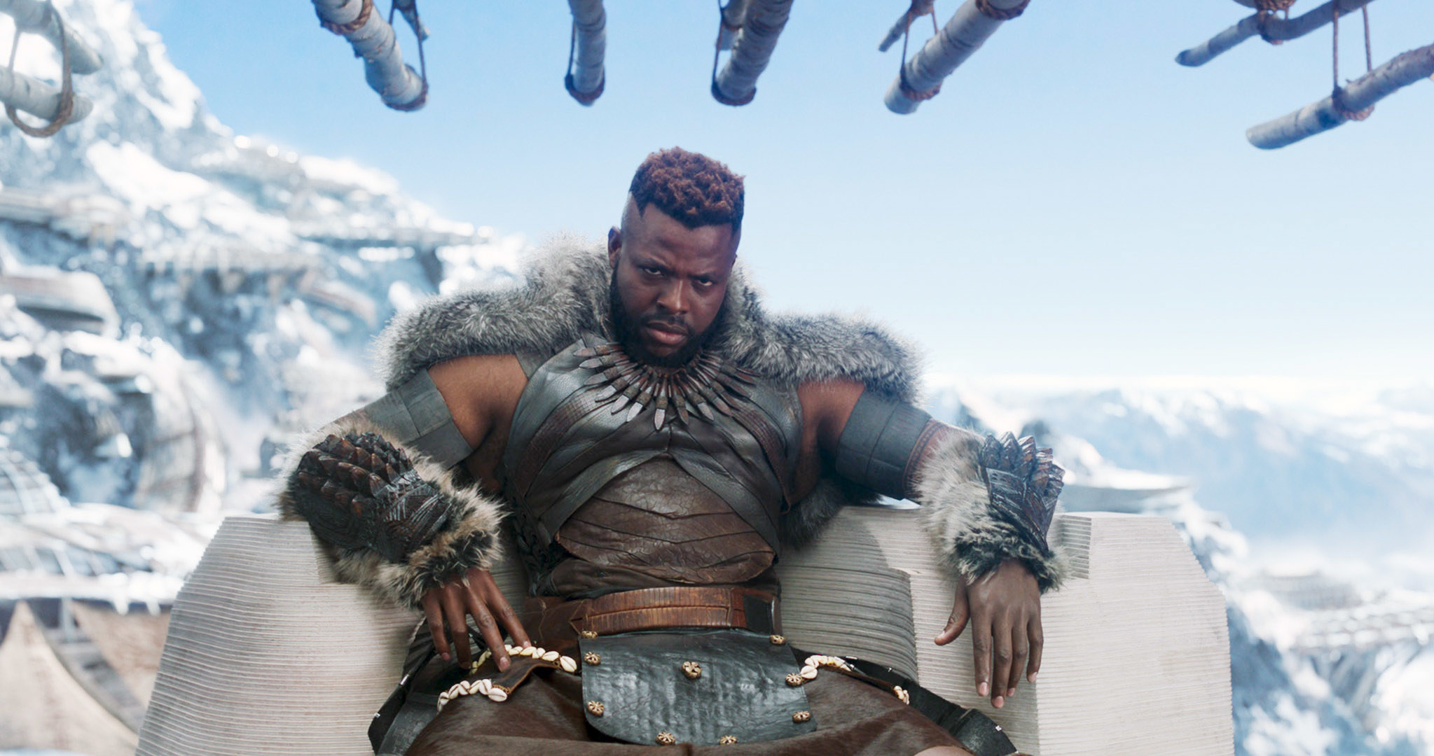 M&#x27;Baku from &quot;Black Panther&quot; sitting on his throne