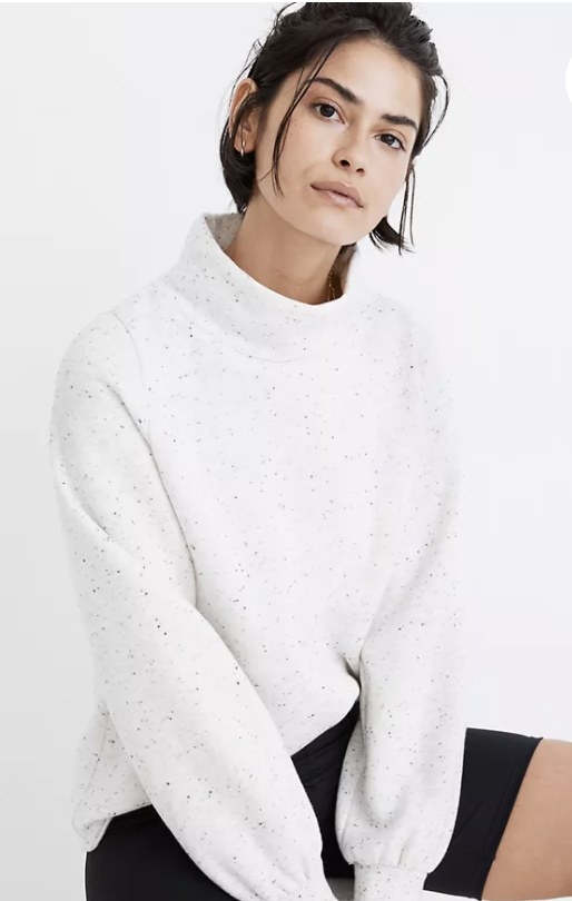 A white turtleneck sweatshirt