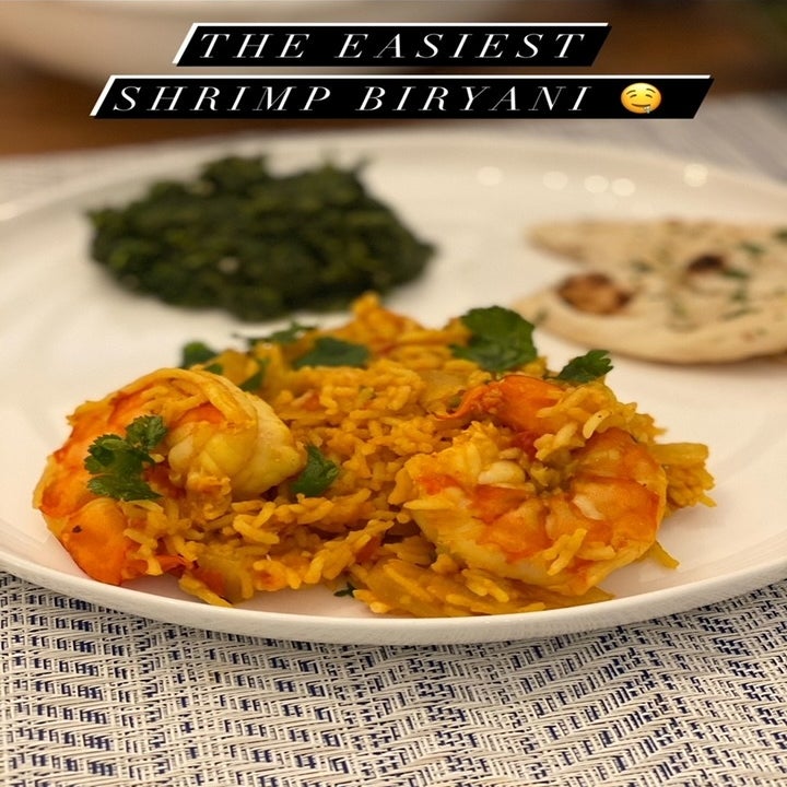Shrimp biryani on a plate.