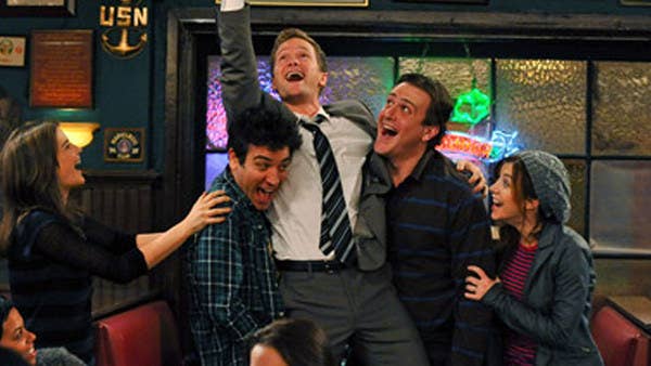 barney is being held up by ted and marshall, all mouths open and brows raised as if excited