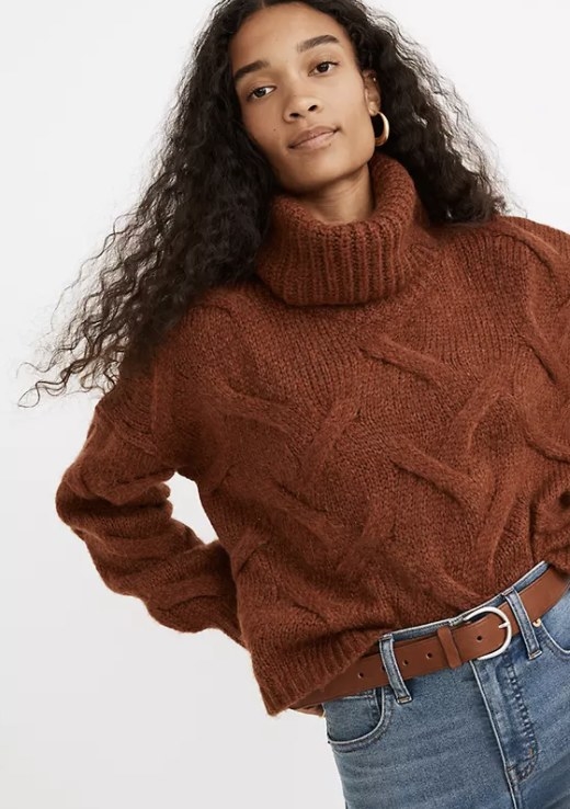An orange cable sweater